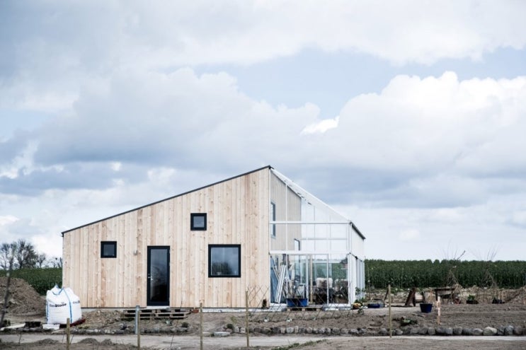 전주협소주택 친환경 주택단지에 지은 두채의 패시브하우스, Affordable sustainable homes by Sigurd Larsen