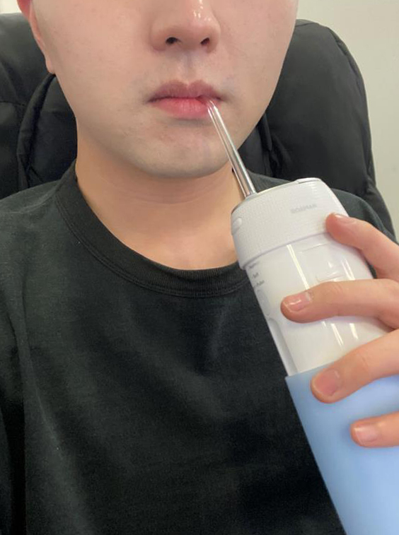  구강세정기 휴대용으로 가볍게 들고 다녀요