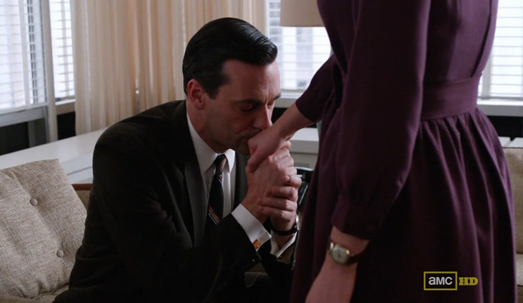  Kissing on the back of the hand means,