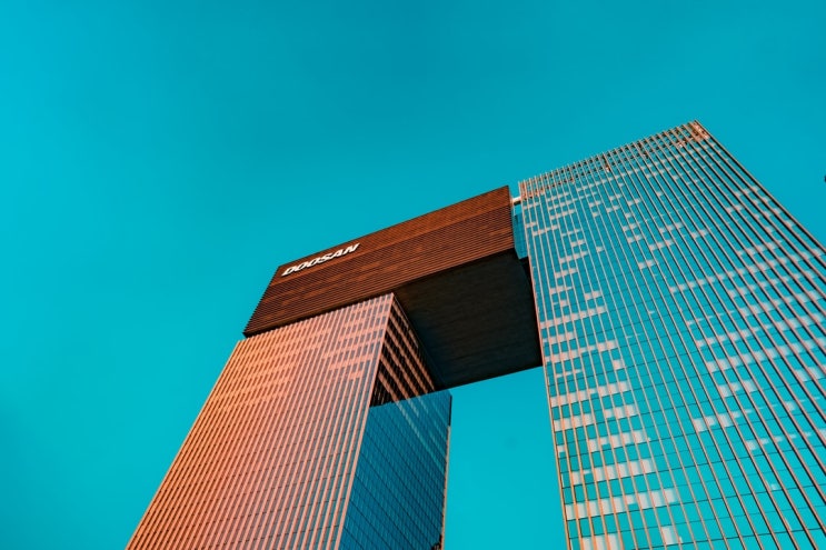 두산인프라코어의 분할합병에 따른 주주에 대한 의제배당 그리고 원천징수 - 법률사무소 시우 조종현 변호사 두산인프라코어의 분할합병에 따른 주주에 대한 의제배당 그리고 원천징수 - 법률사무소 시우 조종현 변호사