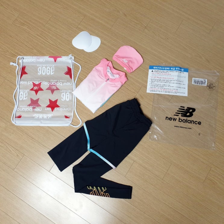  수영복브랜드 뉴발란스 여아 래쉬가드