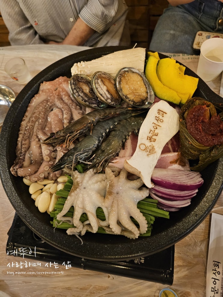  여수 낭만포차 거리 돌문어 삼합 맛집 돌문어상회