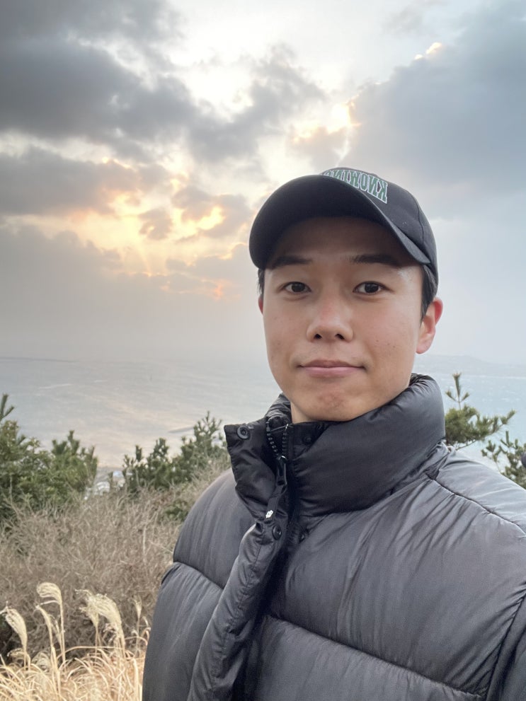 지미봉 정상에서 우도와 성산일출봉을 바라보다 지미봉 정상에서 우도와 성산일출봉을 바라보다