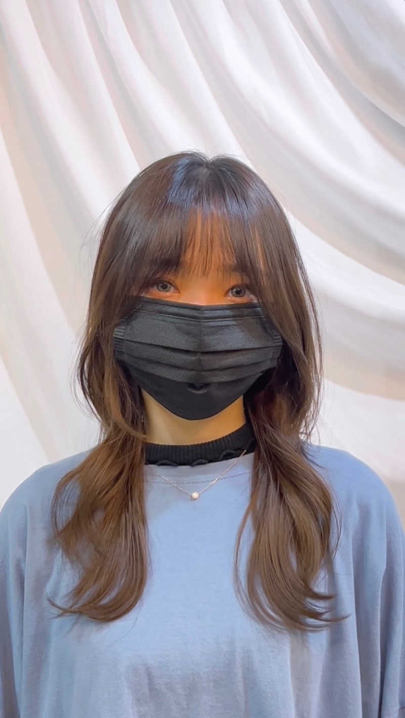 NewJeans Hanni 的中長髮Hush Cut