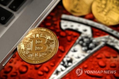 테슬라, 작년에 비트코인 1천730억원 순손실…보유분 75% 매도 테슬라, 작년에 비트코인 1천730억원 순손실…보유분 75% 매도