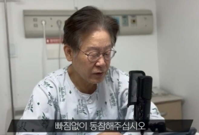 <b>이재명</b>, 환자복 입고 강서구청장 선거 <b>투표 독려</b> "딱 3표가... 
