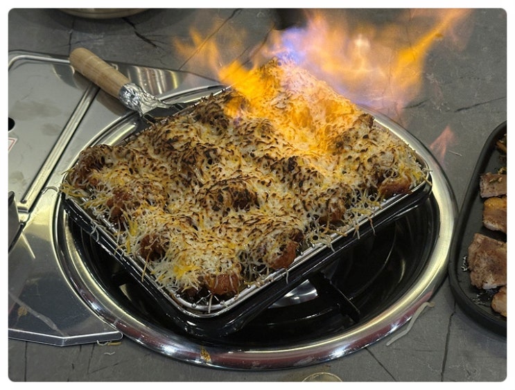  눈꽃 치즈로 덮인 불향 가득한 쭈꾸미 먹으러 망월동맛집 플라워앤쭈 찾아왔어요.