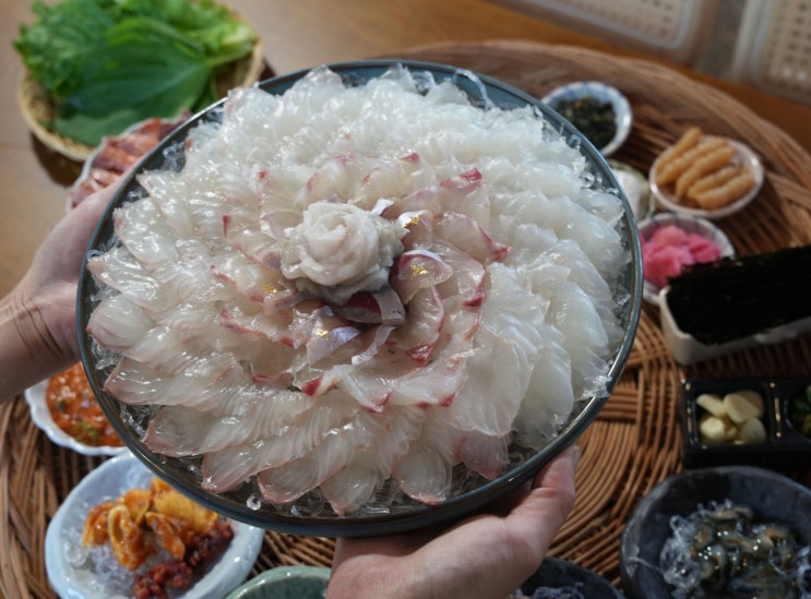  성산횟집  피갈회옥被褐懷玉