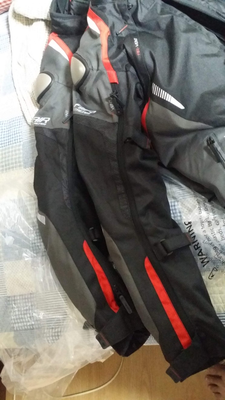  코미네 JK580 XL과 3XL 팔기장 비교