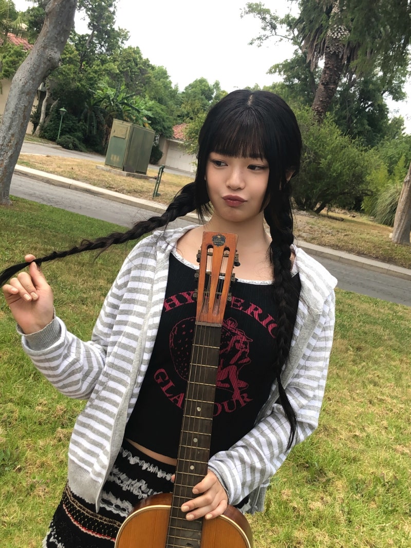 NewJeans Hanni's Instagram Fashion Features Dr. Martens Boots Amidst Group Changes