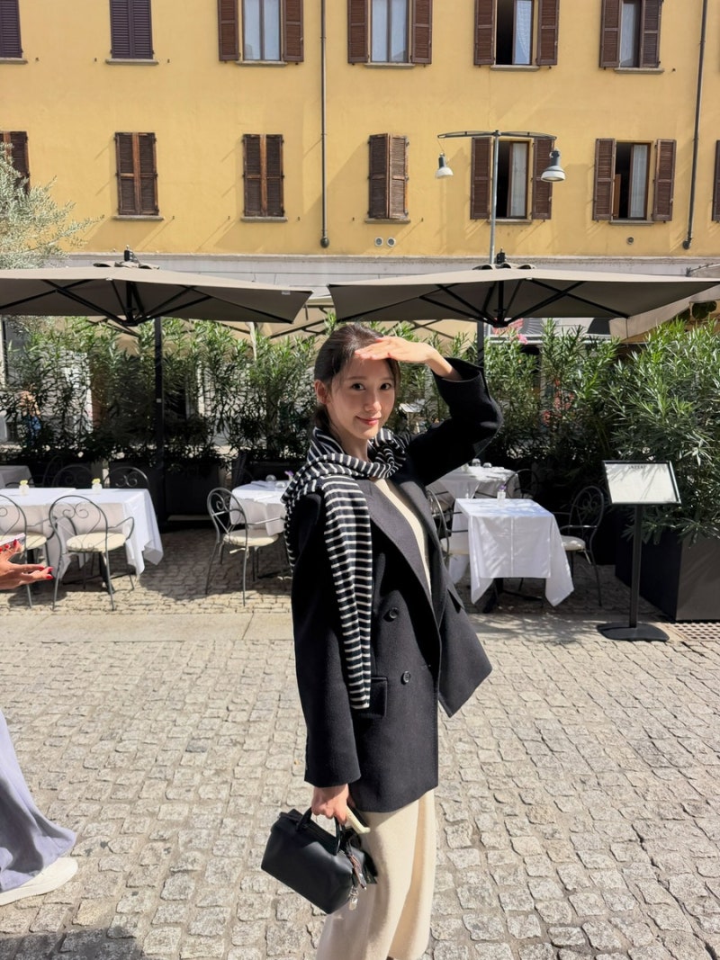 YoonA's Milan Casual Wear: Adding a Striped Knit to a Black Jacket