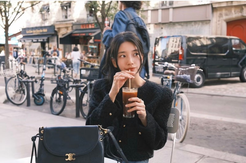 Suzy's Celine Flare Bag: From an All-Black Suit at the Celine Show to an Iced Americano in a Paris Cafe